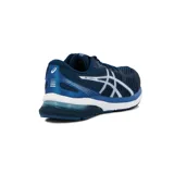 Championes de running Asics modelo Gel-Nagoya 4, color azul marino con detalles en blanco y celeste, con suela amortiguada.