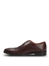 Zapato de vestir formal Hush Puppies modelo Jazz, confeccionado en cuero vacuno color marrón con diseño de puntera reforzada y cierre mediante cordones.
