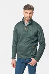 Buzo de felpa con interior de polar, diseño de medio cierre frontal, cuello alto y bolsillos laterales y en el pecho con cierres.