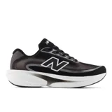 Championes de running New Balance modelo Ellipse, color negro con detalles en blanco y gris. Presentan entresuela Fresh Foam X para mayor amortiguación, parte superior de malla técnica transpirable y suela de goma.