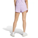 Short deportivo Adidas de running, color violeta, con cintura elástica y diseño ligero.