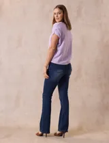 Buzo tejido color blanco, marca Ninety. Escote en V. Calado en escote y delantera.