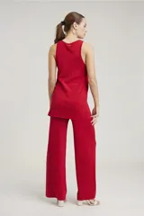 Pantalón de lurex rojo de corte palazzo.