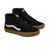 Zapatillas de skate Vans Skate Hi negras con detalles en blanco y suela marrón.