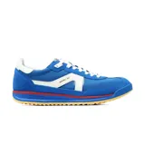 Championes deportivos Skechers modelo SKX 92 Spective, con diseño retro. Presentan una parte superior que combina gamuza, tejido y material sintético en color azul, con detalles en blanco y una suela de goma dentada en color caramelo con una franja roja intermedia.