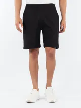 Short de algodón negro con cintura elástica y cordón de ajuste, con logo de la marca bordado en la pierna.