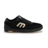 Zapatillas Etnies The Aurelien Michelin, color negro con logo lateral en beige y suela de goma color caramelo.