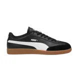 Championes Puma 9T negros con detalles en blanco y suela marrón.