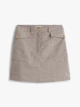 Mini falda de corte recto con estampado de cuadros en tonos beige y marrón. Presenta un diseño clásico con cierre frontal y estructura definida.