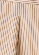 Pantalón de tiro medio color beige con diseño a rayas sutiles, de corte recto y holgado, confeccionado en mezcla de lyocell, viscosa y poliamida.