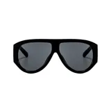 Lentes de sol estilo aviador oversize con armazón negro de acetato y cristales oscuros.