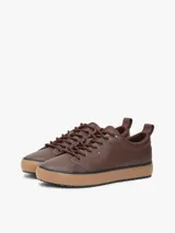 Zapatillas urbanas Tommy Hilfiger modelo Harlem Core Cleat, de color marrón, confeccionadas en material sintético y cuero con cordones a tono y suela de goma marrón.