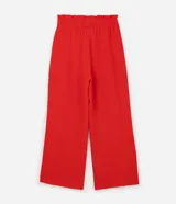 Pantalón pantalona amplia color rojo confeccionada en crepé, con cintura elástica y lazo. Corte amplio, no marca las piernas y se adapta bien a diferentes tipos de cuerpos.