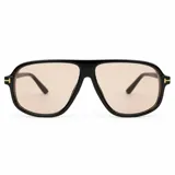 Lentes de sol Tyla de estilo aviador con armazón negro de policarbonato y detalles metálicos dorados en las bisagras. Cuentan con lentes oscuras con protección UV400.