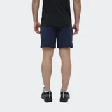 Short deportivo Umbro modelo Terren, color negro, con logo de la marca estampado en blanco en el lateral izquierdo.
