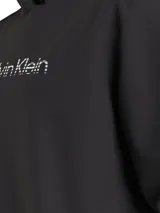 Buzo con capucha Calvin Klein color negro, con mangas largas, puños y dobladillo de canalé, y logo de la marca estampado en el pecho con efecto degradado.