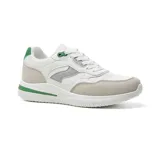 Championes urbanos blancos con detalles en gris y verde.