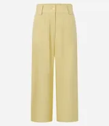 Pantalón pantacourt azul marino de viscosa con lazo delantero, cintura elástica y bolsillos delanteros.