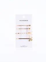 Set de cuatro ondulines dorados para el pelo con diferentes dijes decorativos: dos corazones, una flor calada y una mariposa con textura.