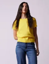 Buzo tejido en hilado fino color naranja, marca Ninety.