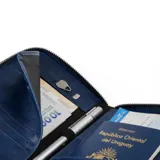 Billetera azul con cierre de cremallera y logo de la marca Baleine grabado en la parte inferior.