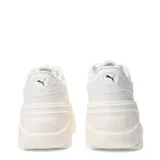 Championes Puma modelo Karmen X-TRA, color marfil, con diseño de plataforma alta y suela robusta. Presentan cordones al tono y detalles de marca en dorado.