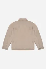 Campera de canvas con diseño utilitario, color negro, con cierre frontal y bolsillo con cierre en el pecho. Presenta cuello camisero y detalles metálicos en los tiradores de los cierres.
