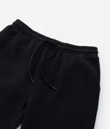 Pantalón de corte recto confeccionado en tejido de algodón, con cintura elástica ajustable mediante lazo y bolsillos laterales.