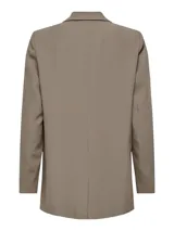 Blazer largo de corte holgado con solapas clásicas y bolsillos delanteros con solapa. Confeccionado en una mezcla de poliéster reciclado y elastano.