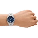 Reloj Emporio Armani plateado con caja de acero inoxidable de 41mm, esfera azul con patrón texturizado, agujas plateadas luminiscentes, indicador de fecha y pulsera de acero inoxidable con cierre desplegable.