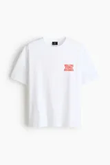 Remera de algodón blanca de corte holgado, con cuello redondo y diseño estampado de The Rolling Stones en el pecho.