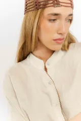 Gorro tejido en crochet color marrón, con hilo 100% algodón.