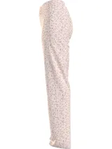 Pantalón de pijama largo color rosa pálido con estampado de letras negras.