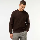 Sweater de punto con diseño trenzado, cuello redondo y mangas largas con puños acanalados.