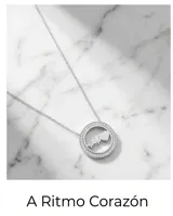 Collar de plata 925 con dije circular adornado con circonias en el borde y un diseño central de ritmo cardíaco con un corazón.