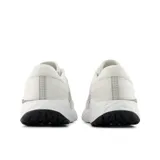 Championes New Balance Evoz V4 para dama, color blanco con detalles en marrón y negro.