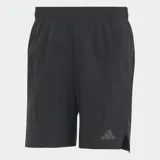 Short deportivo Adidas de entrenamiento, color negro, con cintura elástica y cordón ajustable. Presenta bolsillos delanteros con cierre, dobladillos laterales con muescas y logo de la marca en el frente.