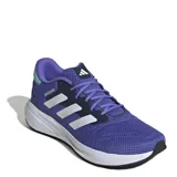 Championes de running Adidas modelo Response Runner, color violeta con las icónicas tres tiras laterales en blanco y detalles en azul oscuro. Presentan una estructura de malla transpirable, mediasuela de EVA para una amortiguación ligera y suela de goma con gran agarre.