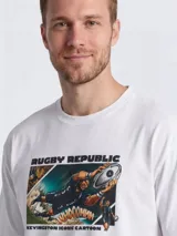 Remera blanca de manga corta con estampado frontal estilo cómic que representa a un jugador de rugby en acción, con el texto Rugby Republic y Kevingston Iconic Cartoon.