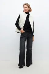 Chaleco capitoneado reversible color azul marino.