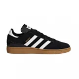 Championes Adidas Busenitz Pro, modelo de skate en color negro con las icónicas tres tiras blancas laterales y suela de goma color caramelo. Presenta una lengüeta larga característica y detalles en dorado.