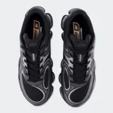 Championes New Balance modelo Abzorb 2000, color negro con detalles plateados y suela con tecnología de amortiguación visible.