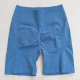 Short deportivo color verde agua, de tiro alto y corte ajustado, con frunce en la parte trasera.