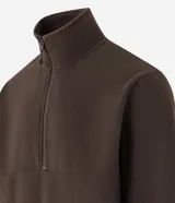 Saco deportivo negro de manga larga, confeccionado en tejido fleece, con cuello alto y cierre frontal parcial de cremallera. Presenta un corte recto y costuras horizontales a la altura del pecho.