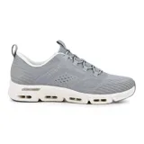 Championes Skechers Glide-Step Gratify color gris con cordones elásticos. Capellada de malla, entresuela geométrica Glide-Step acolchada y plantilla Air-Cooled Memory Foam. Fabricados con materiales 100% veganos.