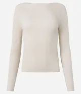 Blusa de punto de manga larga con cuello bote y textura acanalada vertical. Presenta un diseño ajustado al cuerpo, confeccionada en una mezcla de viscosa y poliamida.