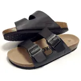 Sandalias negras con plantilla anatómica de corcho y dos correas ajustables con hebilla metálica.