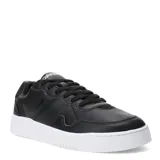 Championes urbanos Topper modelo Terre, color negro con suela de plataforma blanca. Presentan un diseño de corte bajo con cordones al tono y detalles de costuras visibles en el lateral.