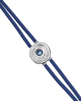 Pulsera de cuero azul con doble tira, dije central plateado con forma de ojo y cristal celeste.