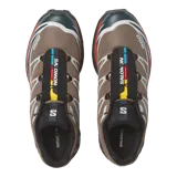 Championes Salomon XT-6, calzado de trail running adaptado para uso urbano. Diseño en color negro, gris, rojo y blanco, con sistema de cordones de ajuste rápido Quicklace y suela de gran tracción.